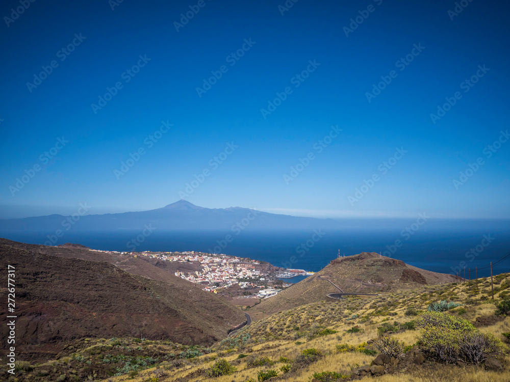 Beautiful city skyline of San Sebastian de La Gomera with Teide volcano of Tenerife at the background, Canary Islands, Spain