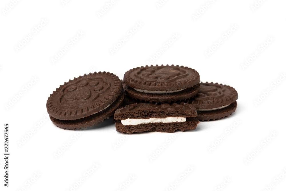 Chocolate cookies with milk filling isolated on white background. Chocolate cookies with milk filling isolated on white background.