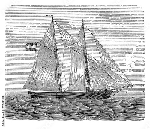 Brigantine with gaff rigged sails, where the sails are four-cornered and controlled to the peak allowing to sail close to the direction of the wind photo