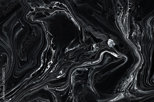 Abstract black marble texture background. Oil, acrylic paint mix pattern.