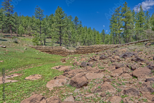 The crumbling ruins of the Foxboro Lake Dam near Munds Park AZ. The dam was built in the 1920s but was abandoned during the 2nd world war. photo