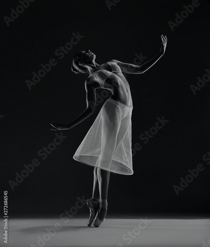 Ballerina in white lingerie and skirt