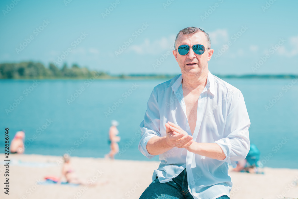 Mature man on a vacation, rest and relax concept. Lifestyle after 50 years 