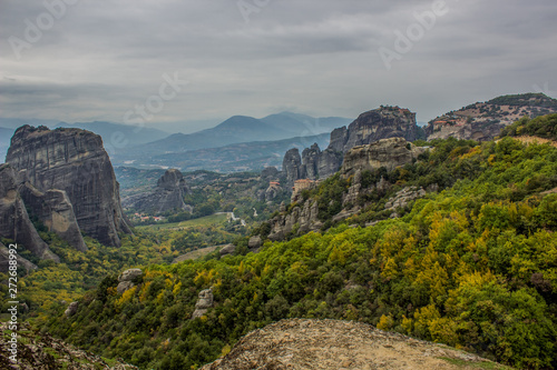 picturesque scenic landscape of famous Greek world heritage destination site for tourists and pilgrimage to christian monasteries, dramatic cloudy autumn season weather time