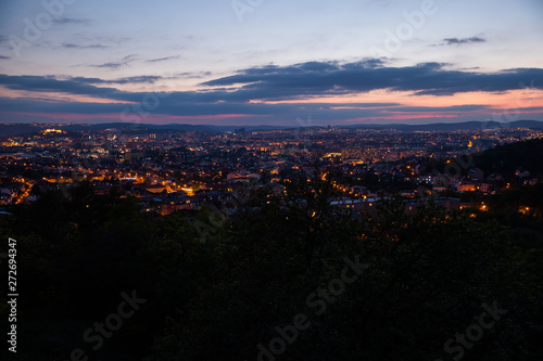 Colorful sunset on Bila Hora with beautiful view on city Brno  Czech Republic pink and orange colors with many clouds
