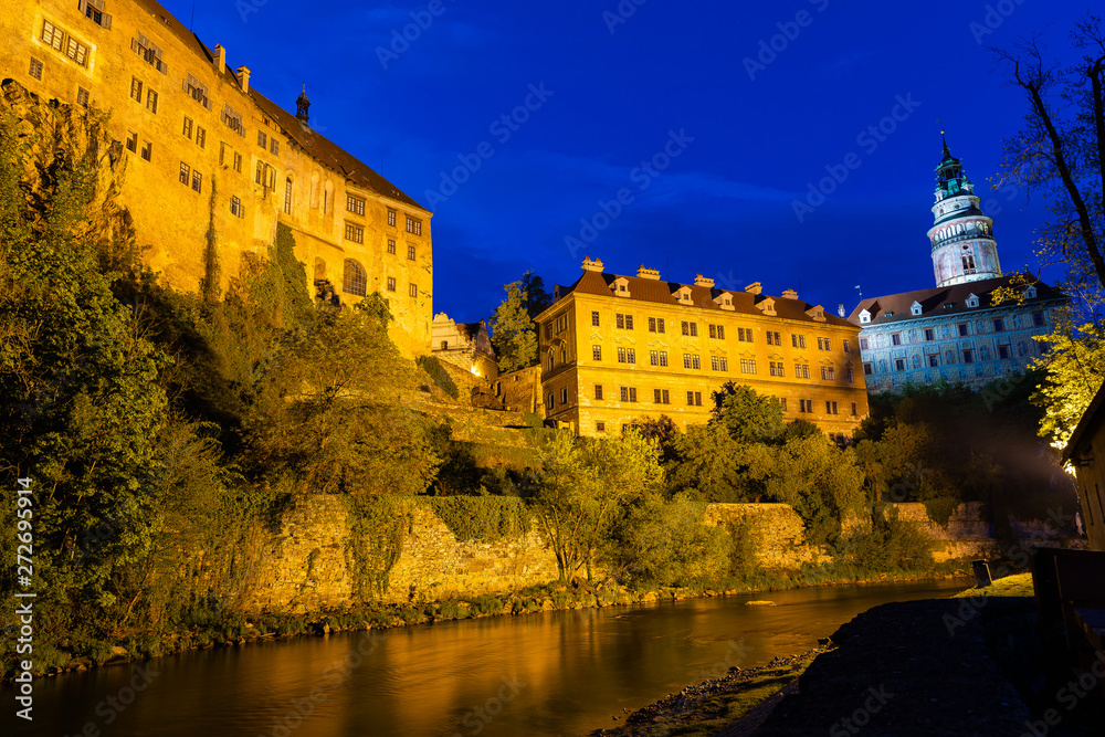 Panoramic landscape view of the historic city of Cesky Krumlov during sunset with famous Cesky Krumlov Castle, Church city is on a UNESCO World Heritage Site captured during spring