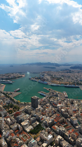 Aerial panoramic view of famous port of Piraeus one of the largest and busiest in Mediterranean sea where passenger ships travel to Aegean destinations, Attica, Greece