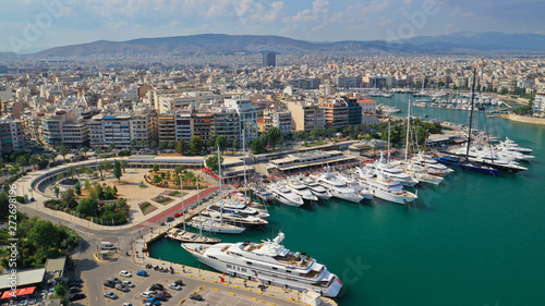 Aerial panoramic view of famous port of Piraeus one of the largest and busiest in Mediterranean sea where passenger ships travel to Aegean destinations, Attica, Greece