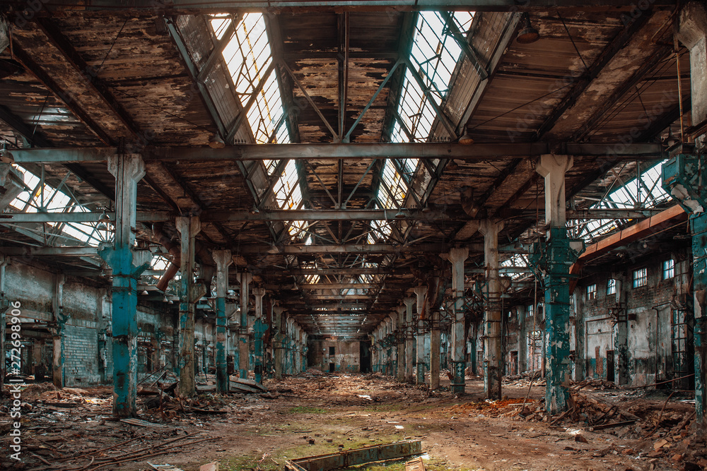 Ruined industrial hall of warehouse or hangar in process of reconstruction Ruined industrial hall of warehouse or hangar in process of reconstruction