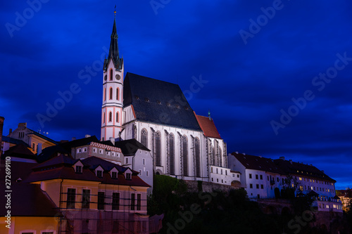 Panoramic landscape sunset view with blue dark sky the historic city of Cesky Krumlov with famous Church city is on a UNESCO World Heritage Site captured during spring with nice sky and clouds