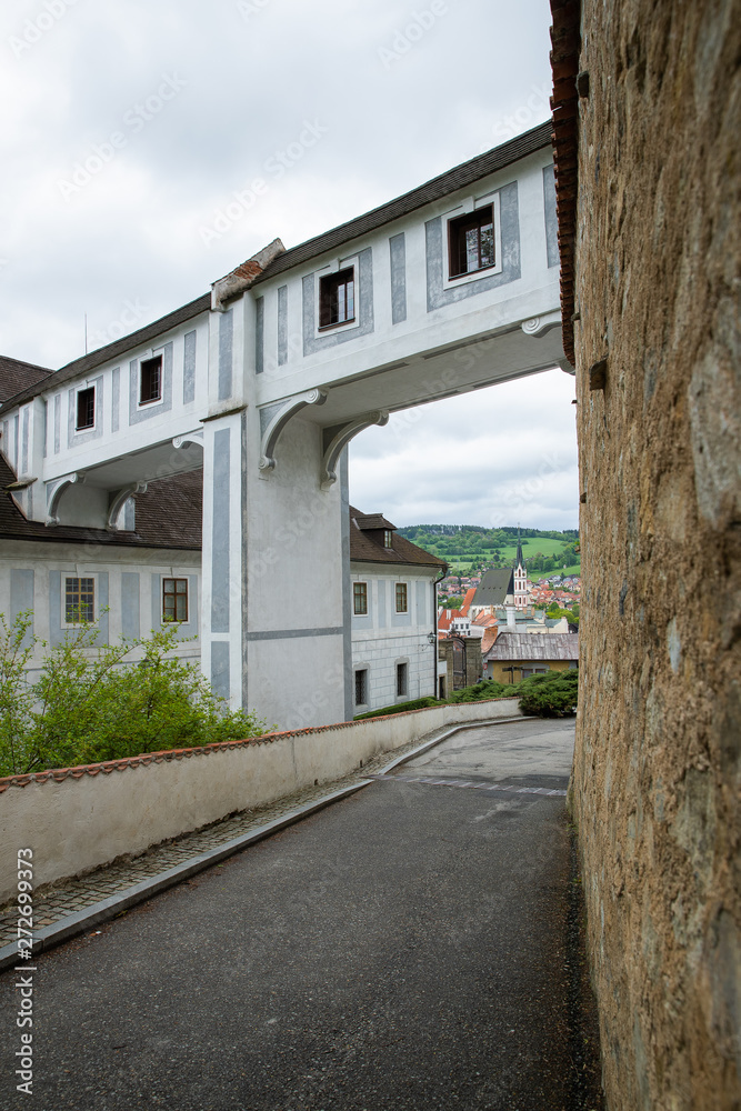 View of the castle and vaulted passage with viaduct with view of Cesky Krumlov with famous Cesky Krumlov Castle, Church of the World Heritage Site