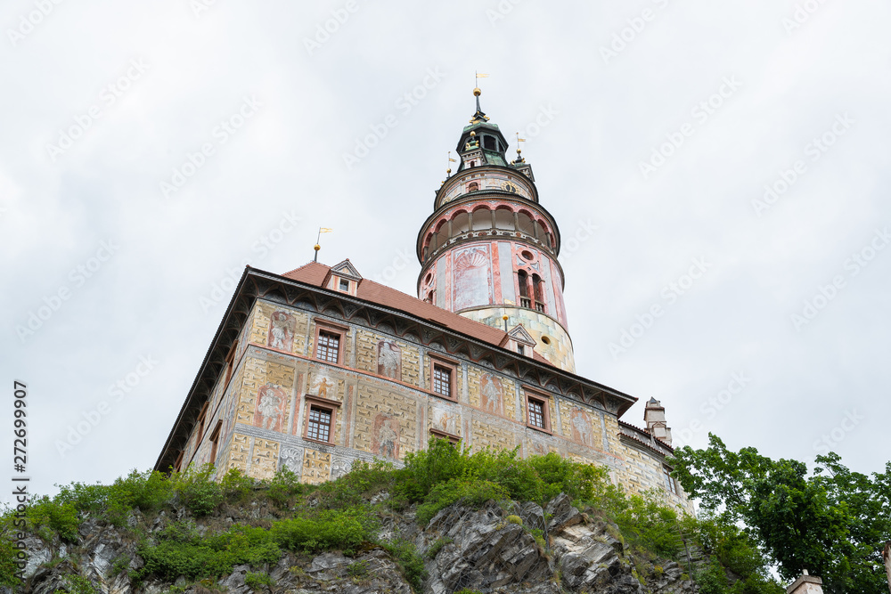 Panoramic landscape view on Castle in the historic city of Cesky Krumlov with famous Church city is on a UNESCO World Heritage Site captured during spring with nice sky and clouds
