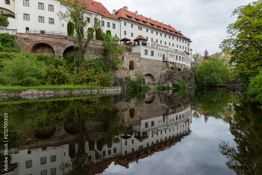 View of the Vltava River and the Church with the Reflection of the Cesky Krumlov River with the Famous Cesky Krumlov Castle, the UNESCO World Heritage Site
