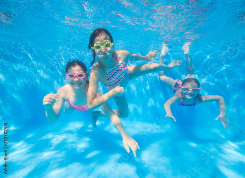 Children swim in  pool