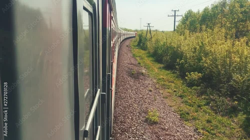 railroad travel concept. locomotive train with passenger wagon carriages moving lifestyle by rail in nature beautiful view outside. tourism travel by the rail railroad travel concept. locomotive train with passenger wagon carriages moving lifestyle by rail in nature beautiful view outside. tourism travel by the rail