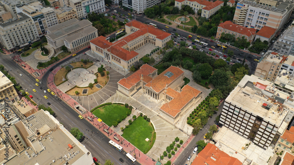 Fototapeta premium Aerial photo of famous landmark buildings of Academy of Athens, Panepistimio and public Library, Athens, Attica, Greece