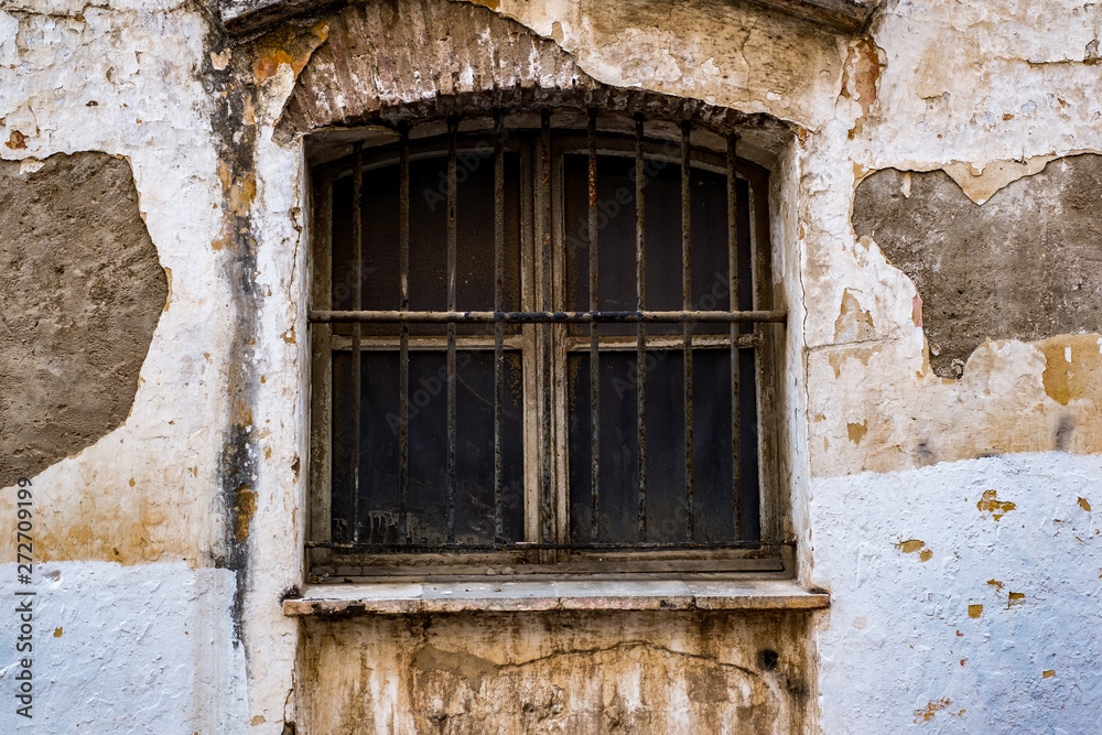 old dusty window with rusty bars old dusty window with rusty bars