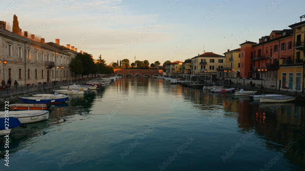 The city of Peschiera del Garda is located in Italy, right on the shore of the lake. Former architecture, a fortress from Venetian times.