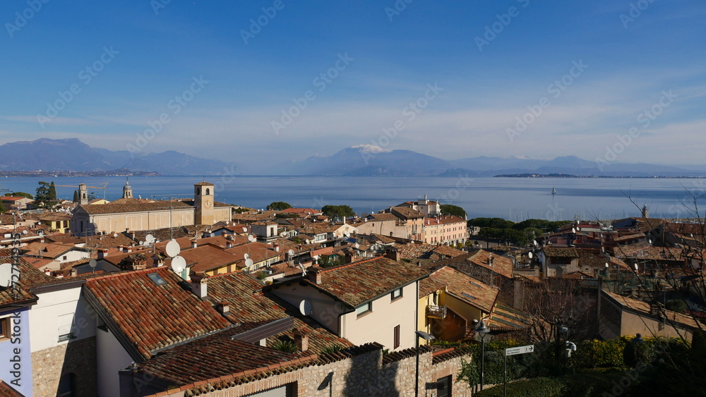 Desenzano del Garda is a historic town located in Italy, right on the shore of the lake. A bird's eye view of the old architecture.