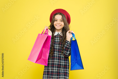 Black friday. Sale discount. Shopping day. Child hold package. Favorite kids brand. Girl with shopping bag. Save money. Live better. Rediscover great shopping tradition. Shopping and purchase
