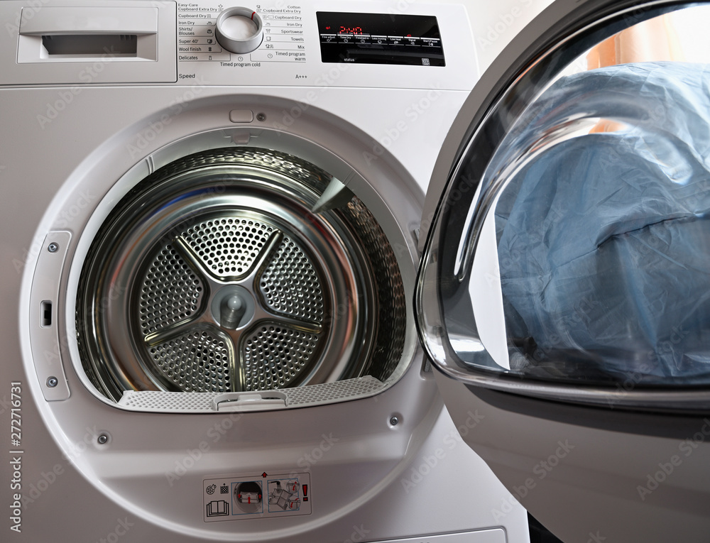 Laundry dryer door open without laundry. Laundry dryer door open without laundry.