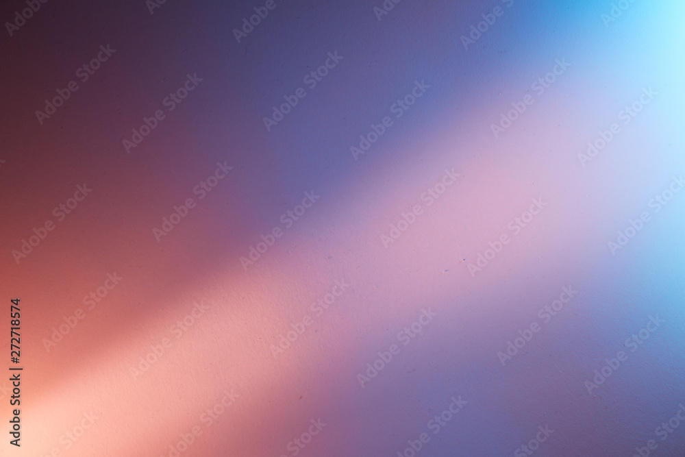Scattered light pink ray of light on light pink blue and light blue background