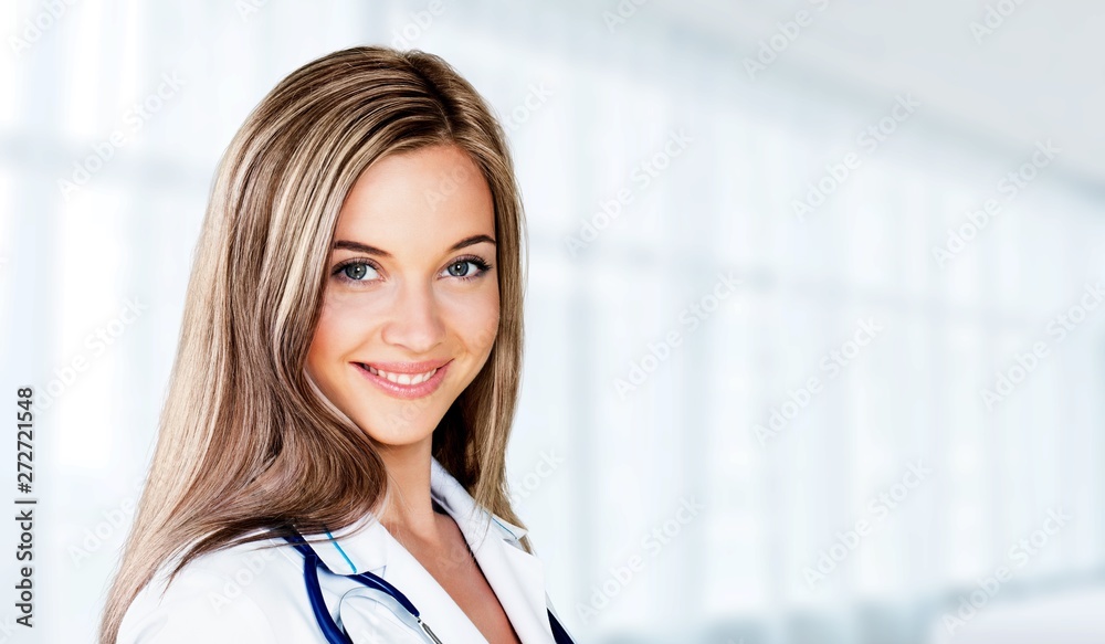 Portrait of doctor with stethoscope on blurred background Portrait of doctor with stethoscope on blurred background