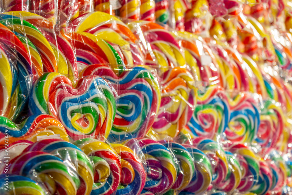 Colorful lollipop candies in nylon packaging