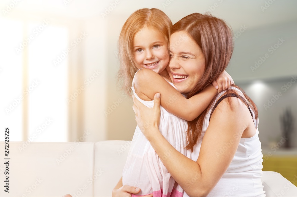 Happy Mother and daughter hugging