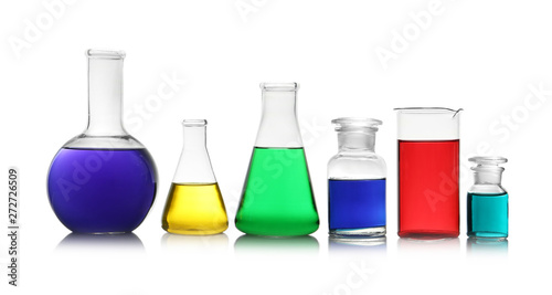 Different glassware with samples on white background. Solution chemistry
