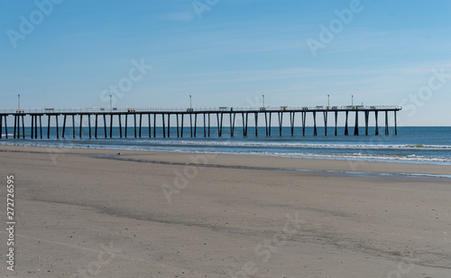 Fishing Pier with Calm Waves