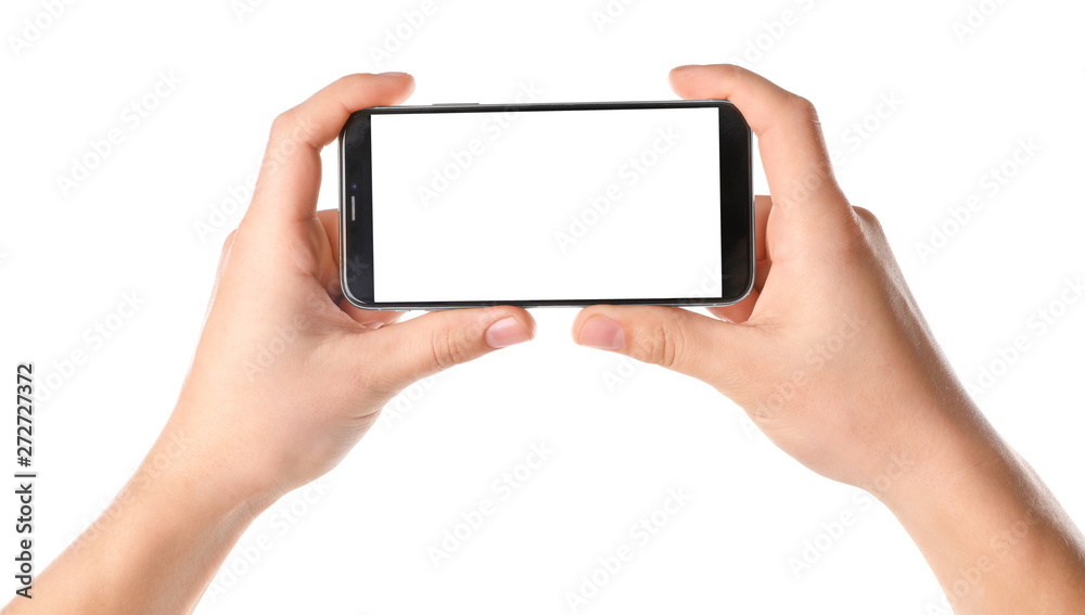 Man holding smartphone with blank screen on white background, closeup of hands. Space for text Man holding smartphone with blank screen on white background, closeup of hands. Space for text