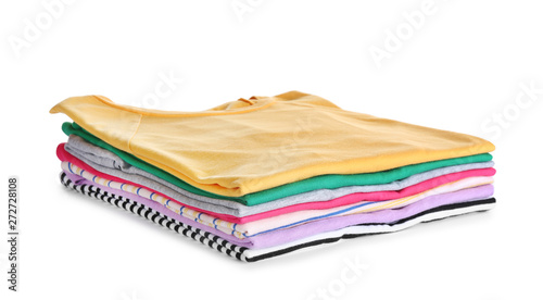 Pile of ironed clothes isolated on white