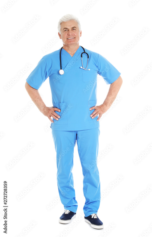 Full length portrait of male doctor in scrubs with stethoscope isolated on white. Medical staff Full length portrait of male doctor in scrubs with stethoscope isolated on white. Medical staff