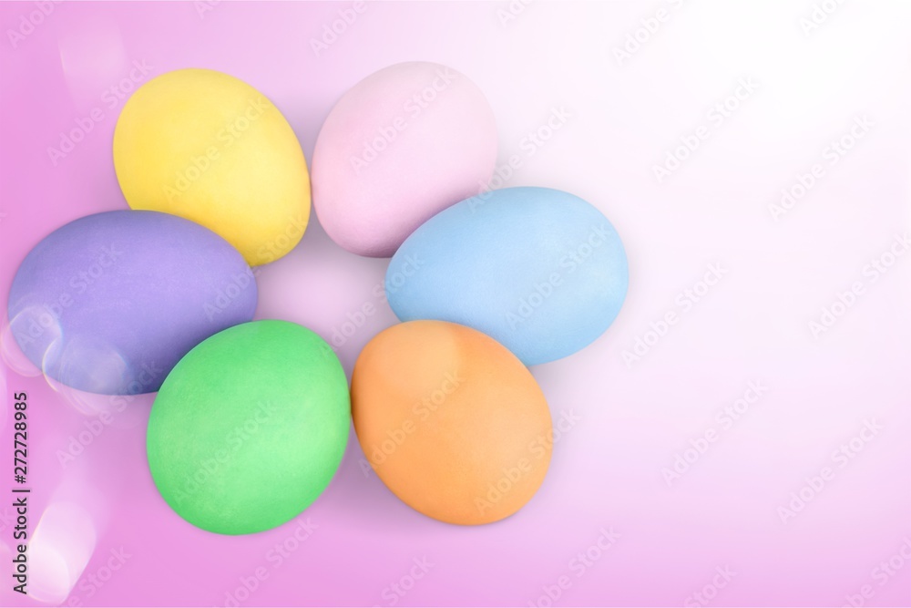 Round with colorful easter eggs on pastel background Round with colorful easter eggs on pastel background