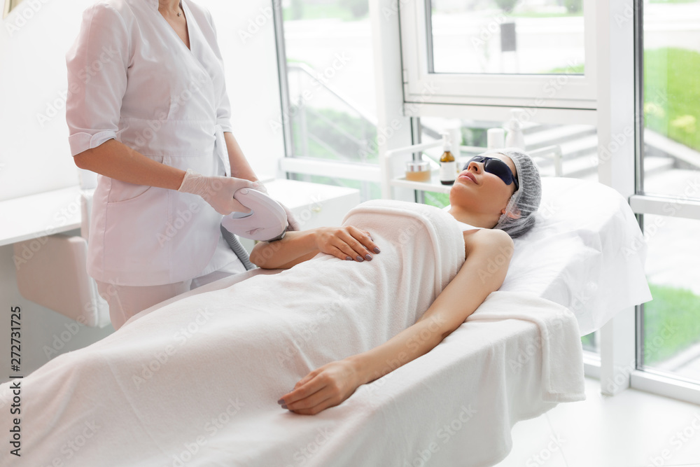 Pleasant nice woman having her hair removed Pleasant nice woman having her hair removed
