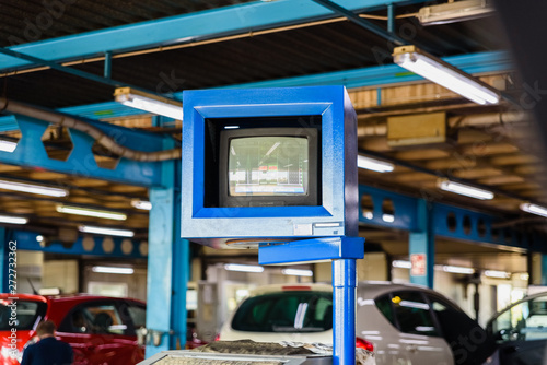 Valencia, Spain - May 29, 2019: Vehicle control monitor at a car technical control station in Spain, ITV. photo