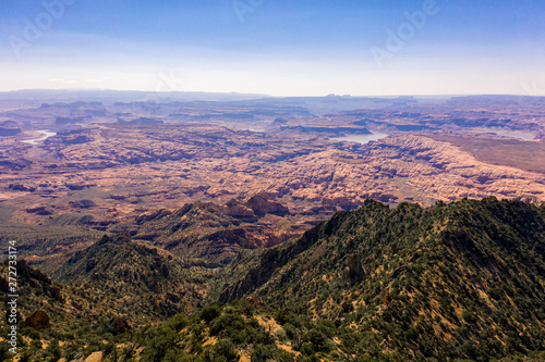 Aerial drone photo - Beautiful Henry Mountains in the Utah desert. Lake Powell in the distance. 