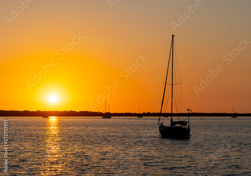 Sailboats on the waters in Florida at sunset