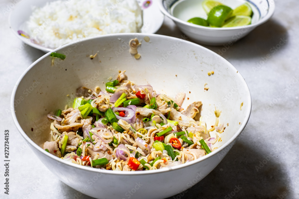 Spicy Beaf Salad with Lemongrass with rice and lemon on table. Thai Food Menu Style. Spicy Beaf Salad with Lemongrass with rice and lemon on table. Thai Food Menu Style.