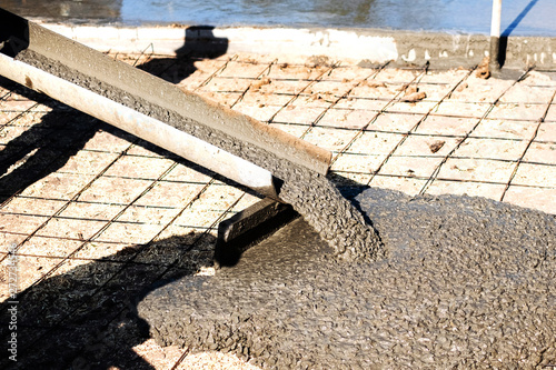 Wallpaper Mural Pouring cement from concrete mixer truck for construction work. Torontodigital.ca