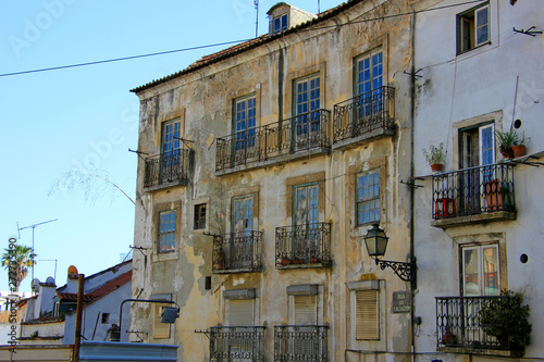 typical historic houses in the streets of lisbon, portugal © Luciernaga