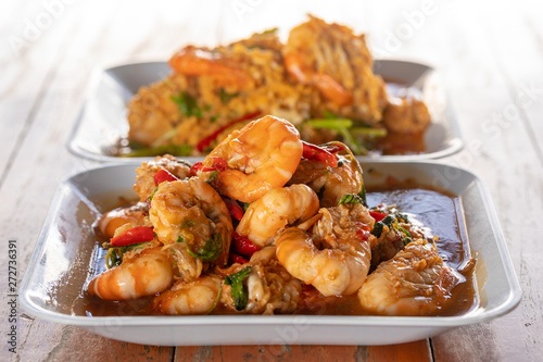 Phad kra phera kung or Stir Fried Shrimp with Basil is a Thai dish in the dish with a sweet, salty taste.