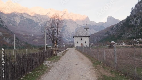 Beautiful Theth Valley and Thethi Church in the Albanian Alps of Albania photo