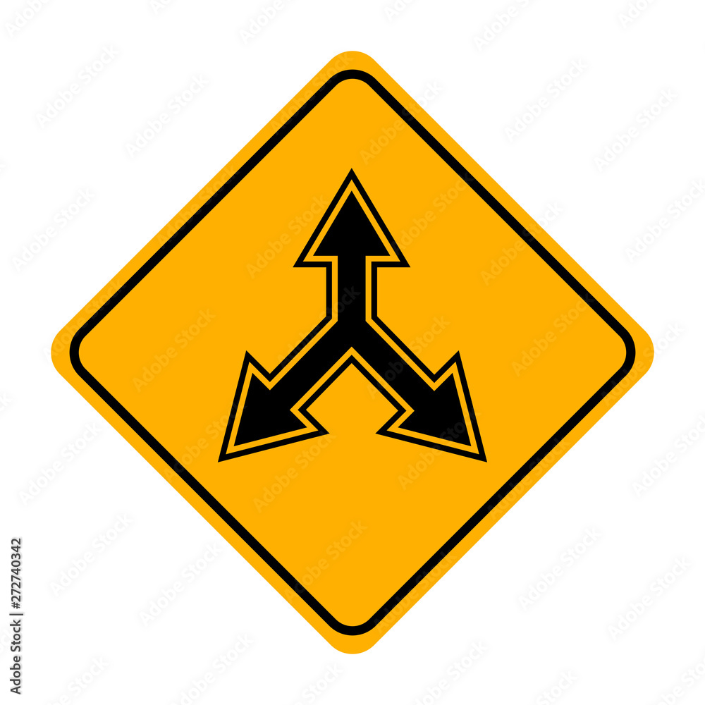 arrow road sign in yellow signage