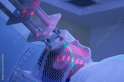 Man Receiving Electron Radiation (Radiotherapy) for Cancer Treatment photo