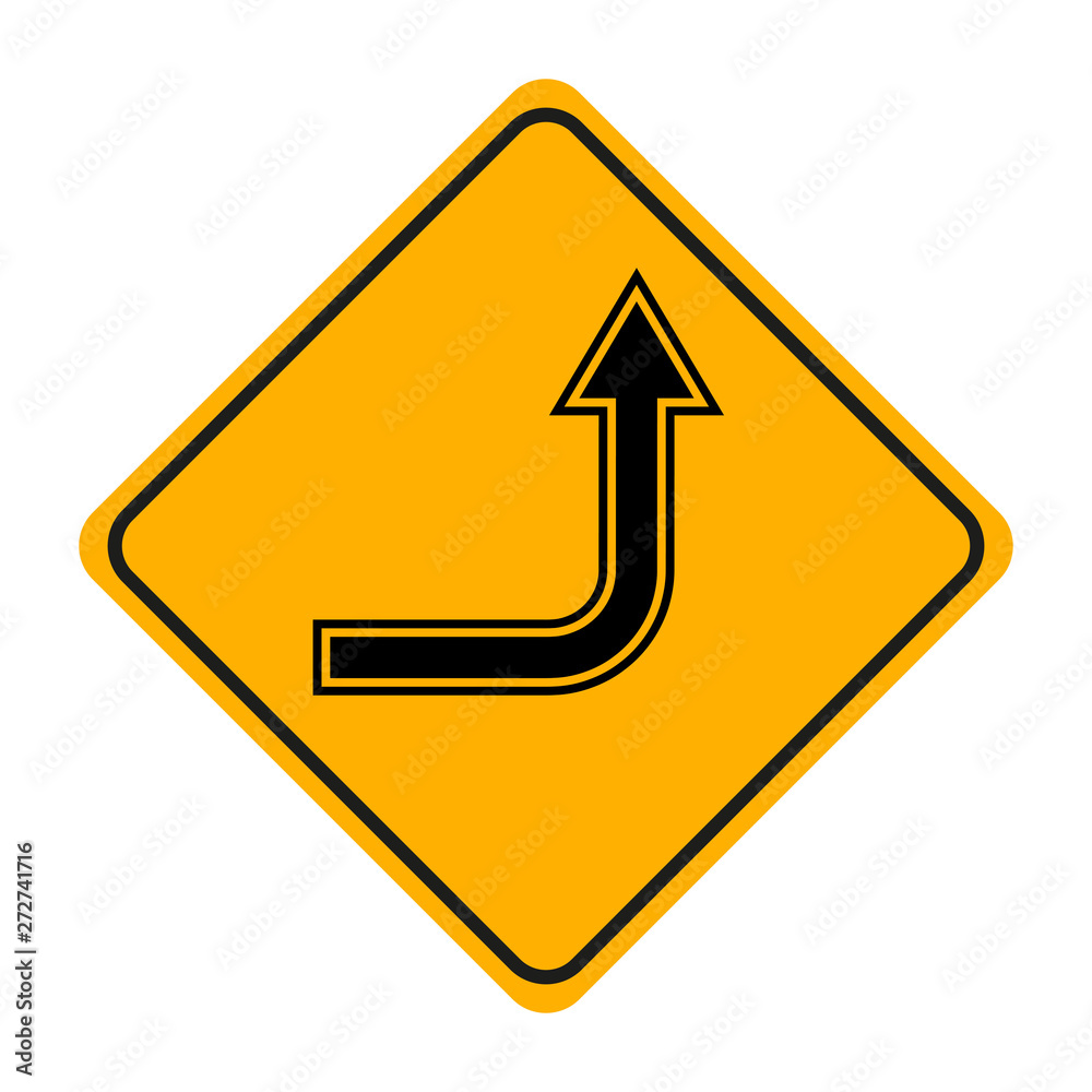 arrow road sign in yellow signage