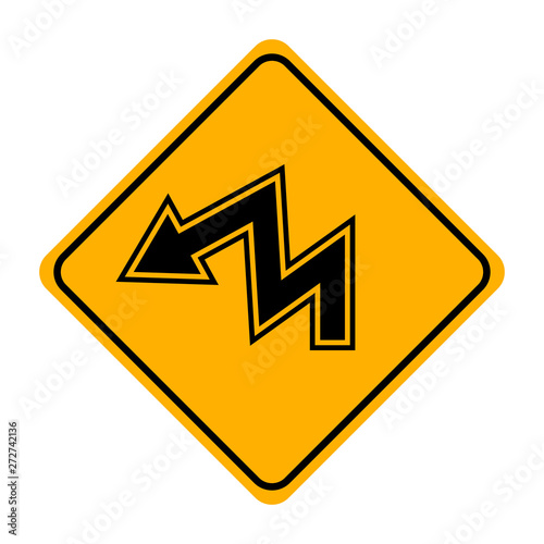 arrow road sign in yellow signage