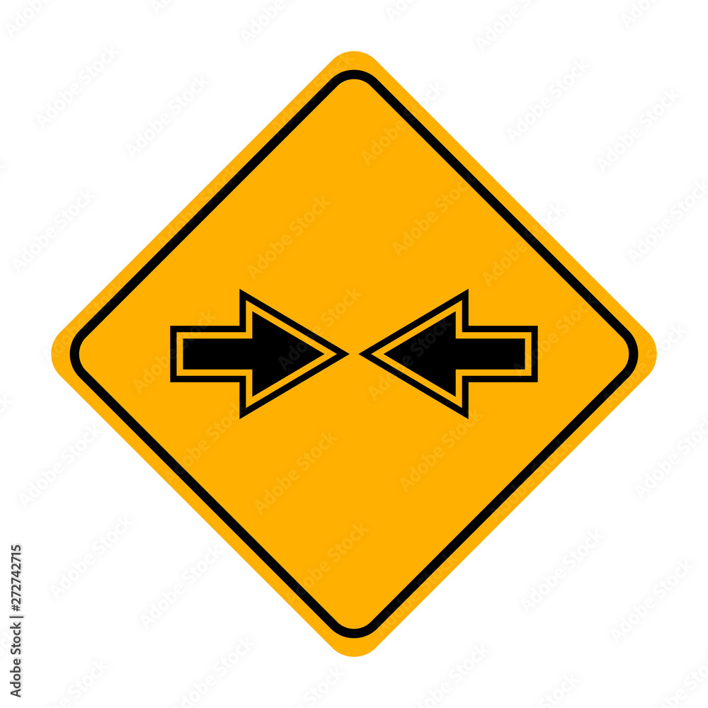 arrow road sign in yellow signage arrow road sign in yellow signage