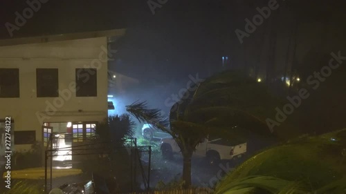 Hurricane Wind And Heavy Rain Hit Town At Night - Haima photo